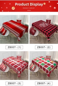 Detail of Nordic Christmas tablecloth and matching pillows in red and green festive patterns