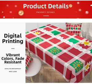 Detail of waterproof Christmas tablecloth with red checkered pattern and Merry Christmas print