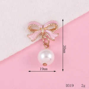 Pink enamel bow pendant with pearl drop for DIY phone accessories, 19mm by 30mm