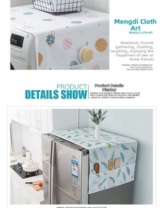 Detail view of refrigerator dust cover with storage pockets and cosmic feather prints