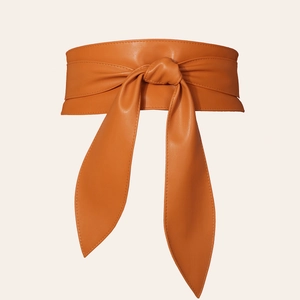 Elegant wide amber PU leather wrap belt with stylish obi knot on a neutral background