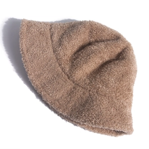 Plush teddy fleece bucket hat in camel brown shown from a top-down flat lay view