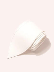Detail view of white PU leather waist belt showing fine texture and reinforced stitching