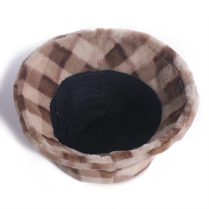 Detailed view of the plush checkerboard bucket hat showing interior lining and texture.
