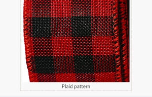 Macro shot of red and black plaid fabric ribbon texture with detailed woven pattern