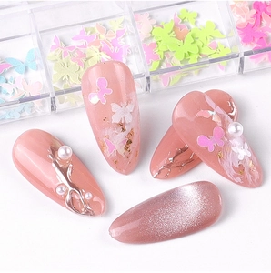 Detailed butterfly nail art sequins in translucent and pearlescent colors for manicures
