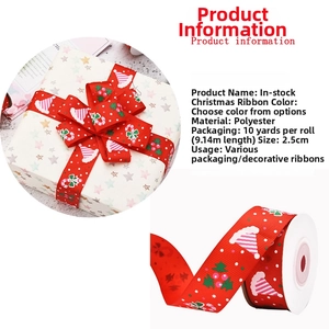 Detail of 2.5cm red Christmas ribbon with gold prints and white dots for gift wrapping
