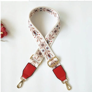 Ethnic wide shoulder strap with red and blue embroidery and gold metal hooks
