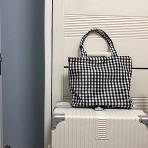 Classic black and white gingham cotton tote bag with sturdy double handles for daily use