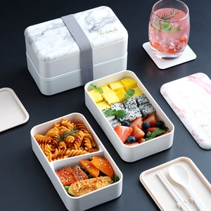 Detail of white marble pattern double-layer bento box with 5 compartments and utensils