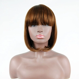 Detailed view of glossy brown bob wig with bangs on a professional mannequin stand