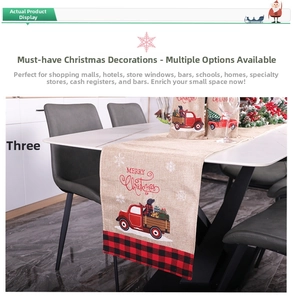 Detail of Christmas table runner with red truck, plaid edges, and Merry Christmas text