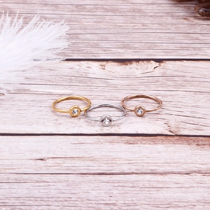 Three-piece minimalist thin ring set in gold, silver, and rose gold with zircon stones