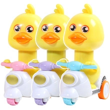 Three duck cartoon toys on scooters in pink, purple, and blue colors for kids