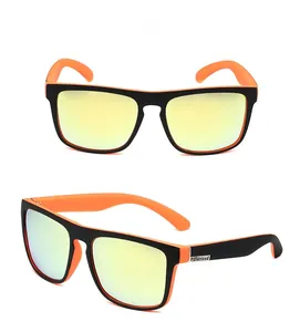 Detail of polarized sports sunglasses showing black and orange frames with green lenses