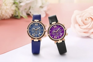 Detailed macro view of Yolako quartz watches with rose gold cases and leather straps