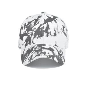 Close-up of black and white tie-dye cotton baseball cap with classic curved brim