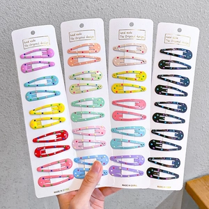 32-piece candy-colored polka dot hair clips set for girls in multiple vibrant colors