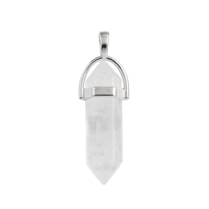 Close-up of hexagonal clear quartz crystal pendant with silver metal bail on white background