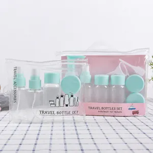 Detail of travel bottle set with spray and lotion pumps in a clear PVC zipper bag