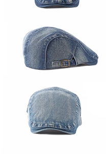Dettaglio della coppola in denim lavato con fibbia in bronzo vintage e tessuto strutturato