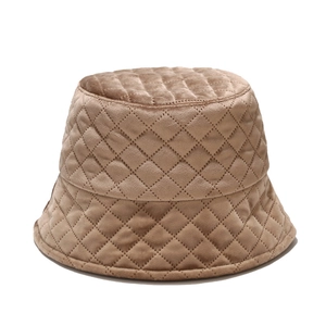 Quilted camel bucket hat with padded lattice pattern for women in winter outdoors