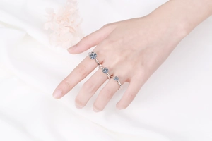 Detailed comparison of S925 sterling silver moissanite rings on hand in three sizes