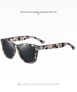 Close-up of polarized sunglasses with black-grey camo frame and grey lenses