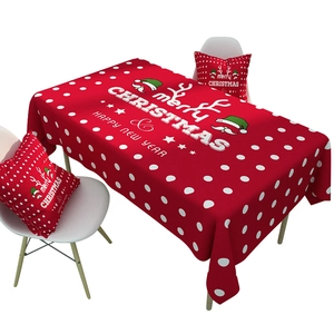 Red Nordic Christmas tablecloth and pillows with Merry Christmas text and white polka dots