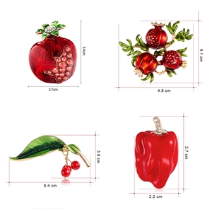 Detailed size specifications for fruit brooches including cherry and pomegranate designs