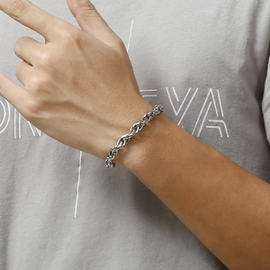 Men's silver stainless steel double link chain bracelet shown on wrist for daily wear