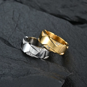Polished 18K gold and silver plated titanium rings with zircon inlay on rock base