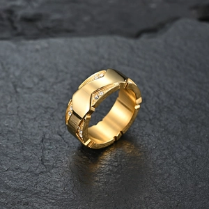 Classic gold plated stainless steel wide ring with multiple set crystals on black rock