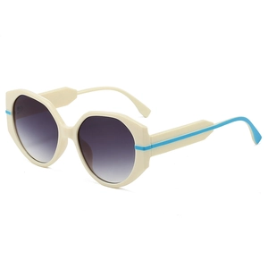Lunettes de soleil géométriques crème avec rayure bleue et verres dégradés