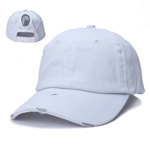 White cotton distressed ponytail baseball cap with torn brim and rear opening design