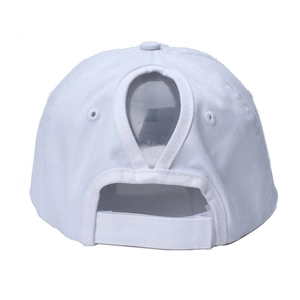 Detail view of the white cotton ponytail baseball cap featuring a back V-opening and velcro strap