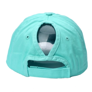Detail view of mint green cotton ponytail baseball cap with velcro strap and rear opening
