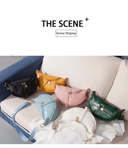 Close-up of crocodile pattern half-moon bags in six vibrant colors with gold zippers