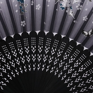 Japanese style hand fan with blue cherry blossoms and butterflies on bamboo frame