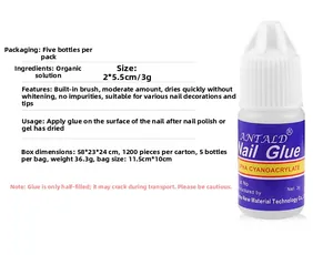 3g nail art glue bottle with brush tip showing applicator detail and liquid texture