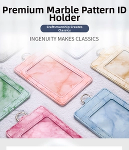 Detail view of marble pattern PU leather ID card holders with clear window and metal hooks