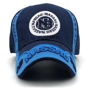 Detailed close-up of 3D embroidery and stitching on a contrast color baseball cap