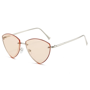 Lunettes de soleil sans monture en forme de cœur avec verres orange et métal argenté