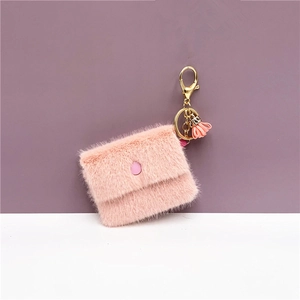 Pink faux fur mini coin purse keychain with envelope flap and soft tassel detail