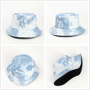 Multi-angle view of tie-dye reversible bucket hat showing the blue watercolor texture