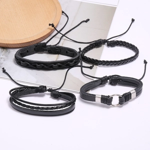 Multilayer black leather woven bracelet set with four unique ethnic and vintage styles