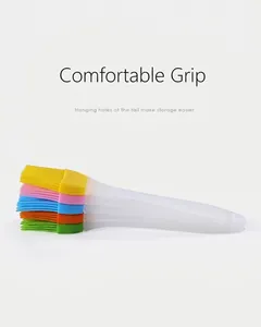 Macro detail of colorful silicone basting brushes with translucent handles and hanging holes