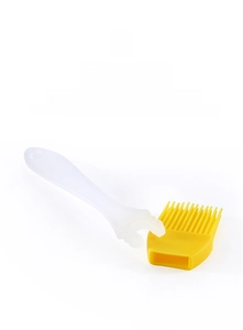 Detail of detachable silicone brush head and translucent handle for easy cleaning