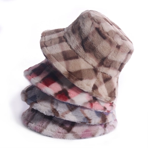 Detailed stacked view of four checkered faux fur bucket hats in diverse winter colors