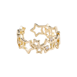 Vintage 18K gold star open ring with micro-pave white zircons in a minimalist style